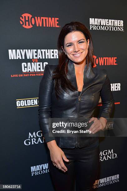 Actress and former mixed martial artist Gina Carano arrives at the MGM Grand Garden Arena for the Floyd Mayweather Jr. Vs. Canelo Alvarez boxing...