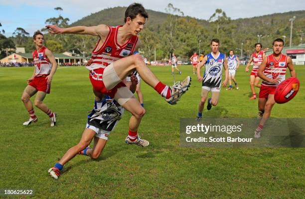 Players compete for the ball during the Yarra Valley Mountain District Football League Under 18 Grand Final between Olinda Ferny Creek and Warburton...