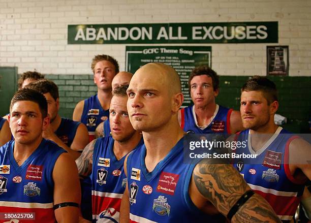 Wandin players listen to their coach in the changing rooms at half time during the Yarra Valley Mountain District Football League Division 1 Seniors...