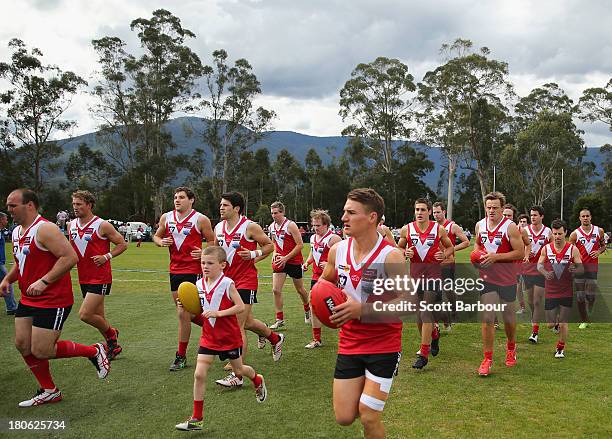 Healesville players warm up before the Yarra Valley Mountain District Football League Division 2 Seniors Grand Final between Healesville and Seville...