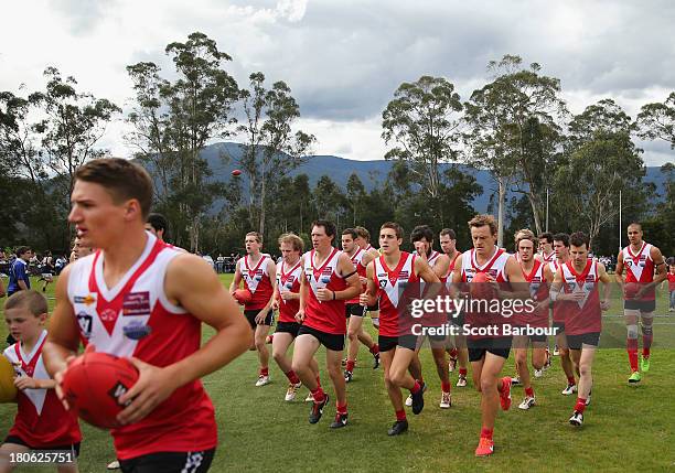 Healesville players warm up before the Yarra Valley Mountain District Football League Division 2 Seniors Grand Final between Healesville and Seville...