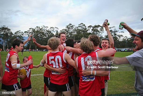 Healesville players celebrate at the final siren after winning the Yarra Valley Mountain District Football League Division 2 Seniors Grand Final...
