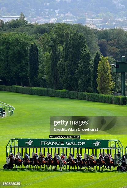 Runners leave the stalls at Longchamp racecourse on September 15, 2013 in Paris, France.