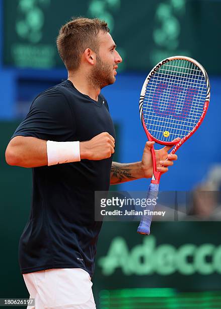 Daniel Evans of Great Britain celebrates winning against Mate Pavic of Croatia during day three of the Davis Cup World Group play-off tie between...