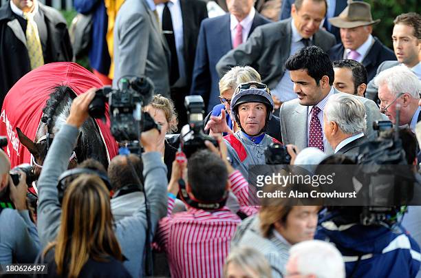 Frankie Dettori riding Treve win The Qatar Prix Vermeille with owner Sheikh Joaan Bin Hamad Al Thani at Longchamp racecourse on September 15, 2013 in...