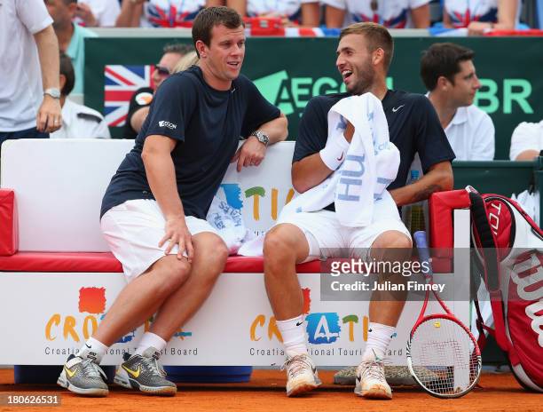Daniel Evans of Great Britain with captain Leon Smith in his match against Mate Pavic of Croatia during day three of the Davis Cup World Group...