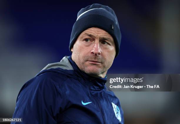 Lee Carsley, Head Coach of England, inspects the pitch prior to the UEFA U21 Euro 2025 Qualifier match between England and Northern Ireland at...