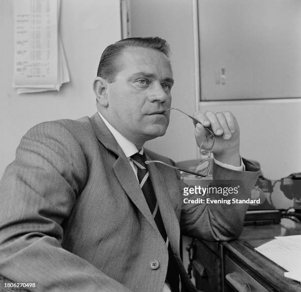 Czech tennis player Jaroslav Drobný seated in an office, June 26th 1961.