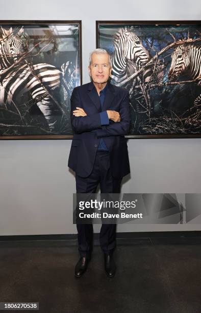 Mario Testino attends a private view of Mario Testino's new exhibition 'Gone Wild' at Hamiltons Gallery on November 21, 2023 in London, England.