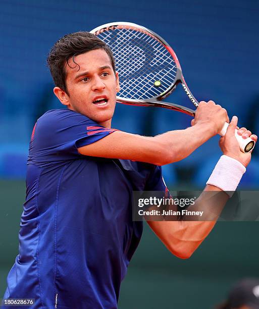 Mate Pavic of Croatia in action against Daniel Evans of Great Britain during day three of the Davis Cup World Group play-off tie between Croatia and...