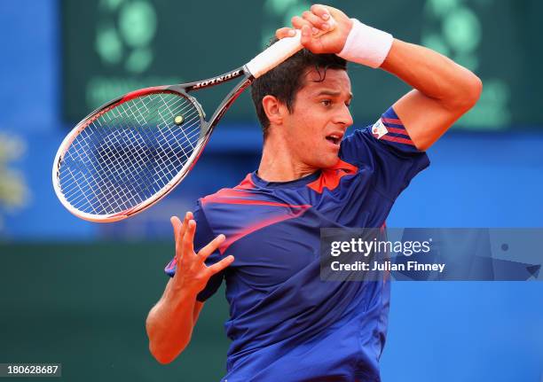 Mate Pavic of Croatia in action against Daniel Evans of Great Britain during day three of the Davis Cup World Group play-off tie between Croatia and...