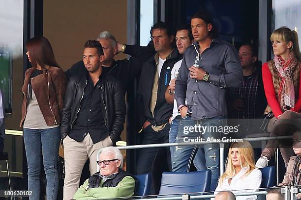 Tobias Weis and Tim Wiese of Hoffenheim watch stand in the tribune during the Bundesliga match between 1899 Hoffenheim and Borussia Moenchengladbach...