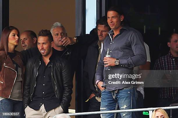 Tobias Weis and Tim Wiese of Hoffenheim watch stand in the tribune during the Bundesliga match between 1899 Hoffenheim and Borussia Moenchengladbach...