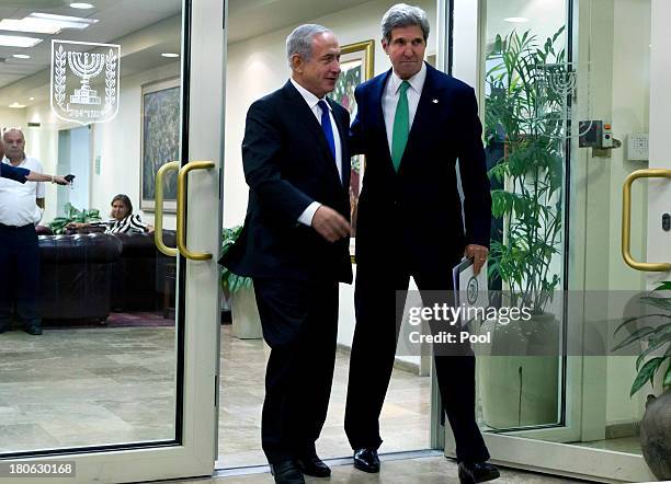 United States Secretary of State John Kerry and Israeli Prime Minister Benjamin Netanyahu as they walk out from their lengthly meeting in the prime...