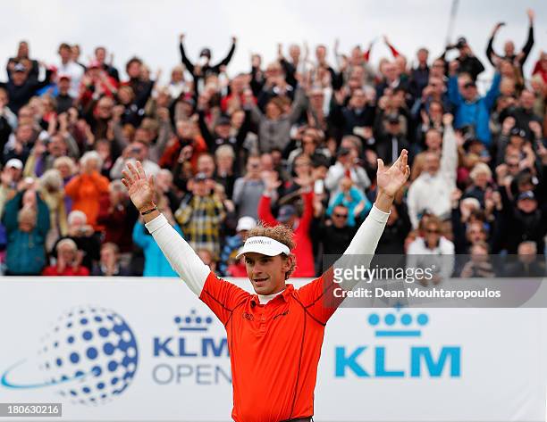 Joost Luiten of Netherlands celebrates after winning the KLM Open at Kennemer G & CC on September 15, 2013 in Zandvoort, Netherlands.
