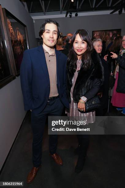 Jamie Chung and Ching He Huang attend a private view of Mario Testino's new exhibition 'Gone Wild' at Hamiltons Gallery on November 21, 2023 in...