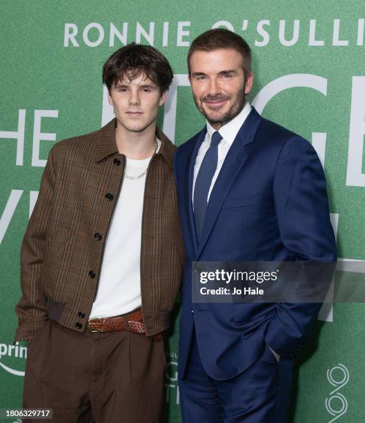 Cruz Beckham and David Beckham arrive at the "Ronnie O'Sullivan: The Edge of Everything" Premiere at Odeon West End on November 21, 2023 in London,...