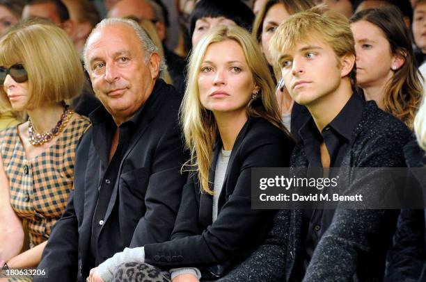 Anna Wintour, Sir Phillip Green, Kate Moss and Brandon Green attend the Unique SS14 runway show during London Fashion Week on September 15, 2013 in...