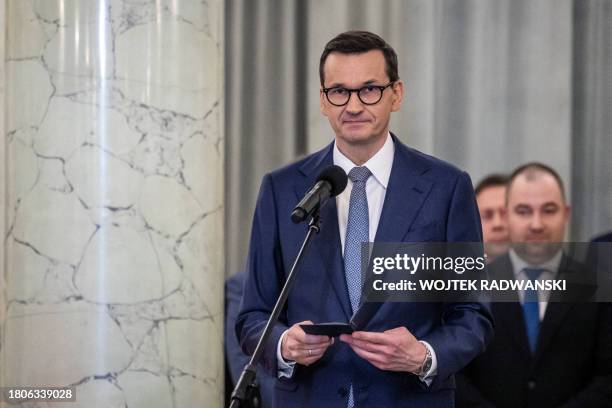 Newly-appointed Polish Prime Minister Mateusz Morawiecki of the Law and Justice party delivers a speech during the swearing-in ceremony of the new...