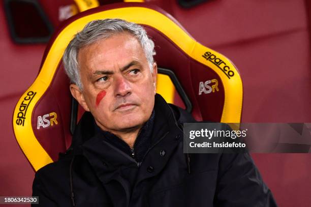 Jose Mourinho coach of AS Roma with the red sign of solidarity on the international day against violence against women during the Serie A football...