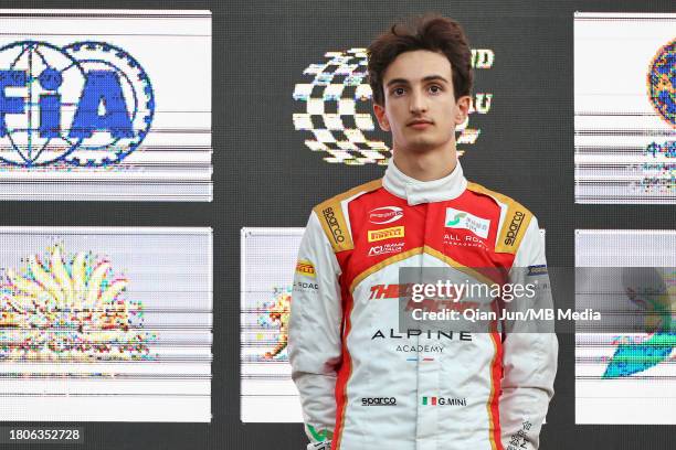 Gabriele Mini of Italy and SJM Theodore PREMA Racing on the podium during the Formula 3 Macau Grand Prix FIA F3 World Cup as part of the 70th Macau...