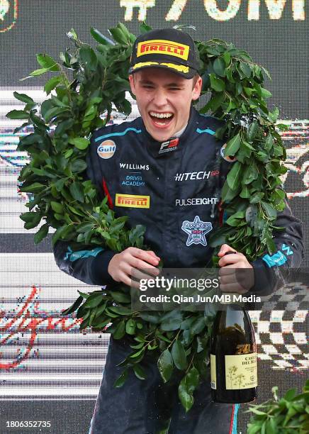 Luke Browning of Great Britain and Hitech Pulse-Eight celebrates his win on the podium during the Formula 3 Macau Grand Prix FIA F3 World Cup as part...