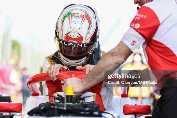 Gabriele Mini of Italy and SJM Theodore PREMA Racing gets into his car on the grid during the Formula 3 Macau Grand Prix FIA F3 World Cup as part of...