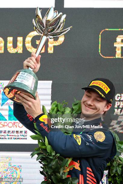 Dennis Hauger of Norway and MP MOTORSPORT celebrates his second place finish on the podium during the Formula 3 Macau Grand Prix FIA F3 World Cup as...