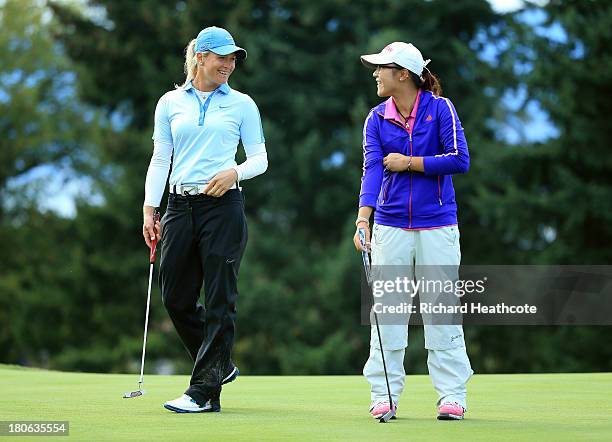 Suzann Pettersen of Norway and Amateur Lydia Ko of New Zealand during the third round of The Evian Championship at the Evian Resort Golf Club on...