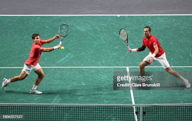 Alexis Galarneau of Canada plays a backhand during the Quarter Final match against Otto Virtanen and Harri Heliovaara of Finland in the Davis Cup at...