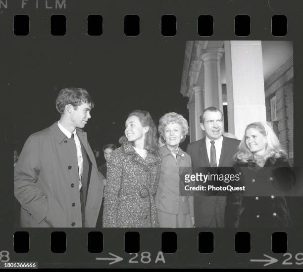 View of married couple, future US First Lady Pat Nixon and President-Elect Richard Nixon as they pose with, future son-in-law David Eisenhower , and...