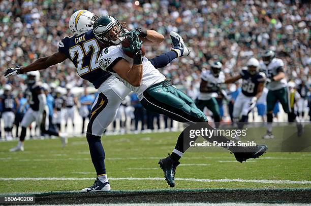 Wide receiver Riley Cooper of the Philadelphia Eagles catches a pass past cornerback Derek Cox of the San Diego Chargers in the second quarter for a...