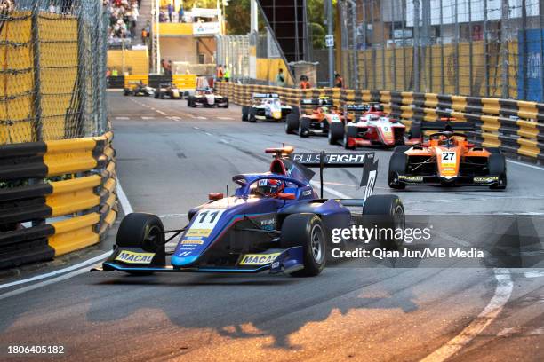 Luke Browning of Great Britain and Hitech Pulse-Eight leads Dennis Hauger of Norway and MP MOTORSPORT and rest of the field during the Formula 3...