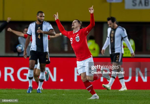 Marcel Sabitzer of Austria celebrates after scoring his team's first goal during the international friendly match between Austria and Germany at...