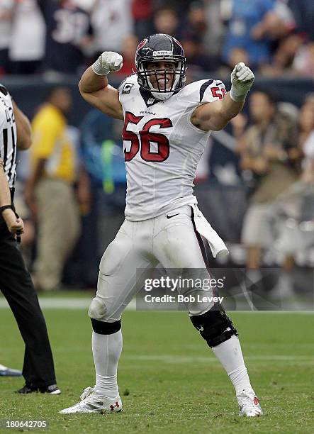 Brian Cushing of the Houston Texans gets the crowd going after making a big tackled in the second quarter against the Tennessee Titans at Reliant...