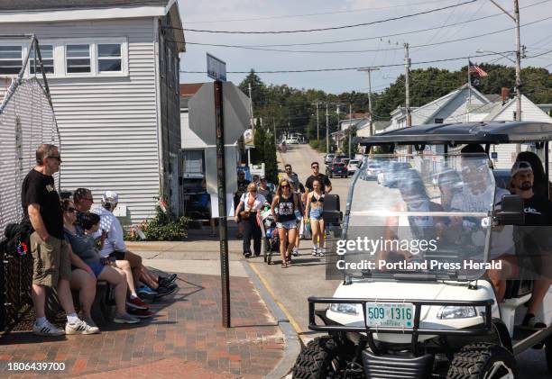 Groups of people head down for a beach day in Old Orchard Beach on Saturday, September 2, 2023.