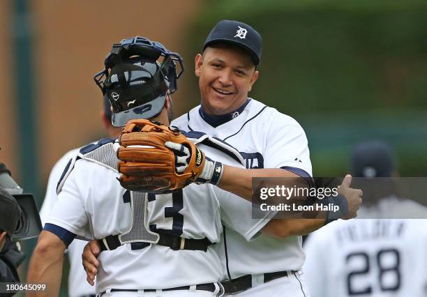 Miguel Cabrera and Alex Avila of the Detroit Tigers celebrate a win over the Kansas City Royals at Comerica Park on September 15, 2013 in Detroit,...