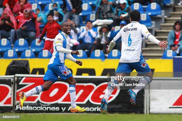 Damarcus Beasley of Puebla celebrates score a goal against Toluca during a match as part of Apertura 2013 Liga MX at Cuauhtemoc Stadium on September...
