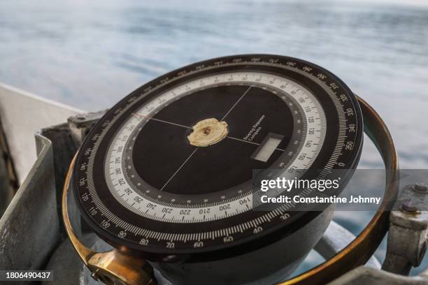 close up of nautical bearing repeater compass on naval vessel - repeater stock pictures, royalty-free photos & images