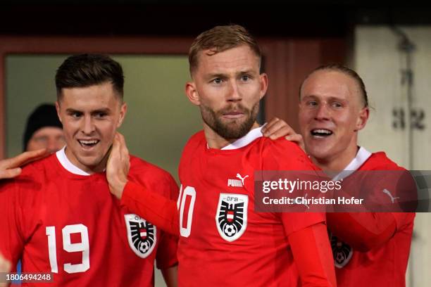 Christoph Baumgartner of Austria celebrates with Florian Grillitsch after scoring the team's second goal during the international friendly match...