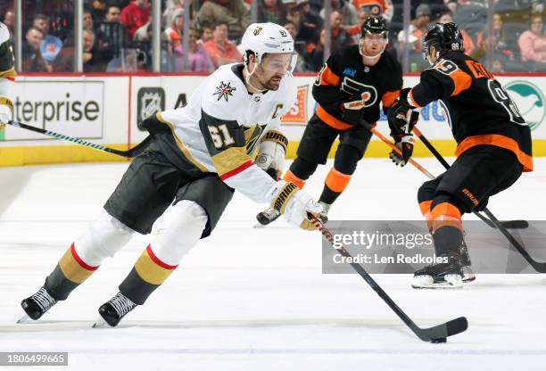 Mark Stone of the Vegas Golden Knights skates the puck against the Philadelphia Flyers at the Wells Fargo Center on November 18, 2023 in...