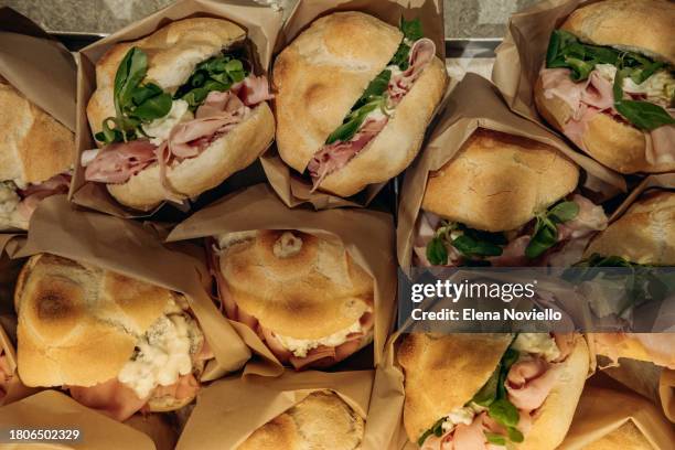 takeaway sandwiches bun with salami and mozzarella - prosciutto stock pictures, royalty-free photos & images