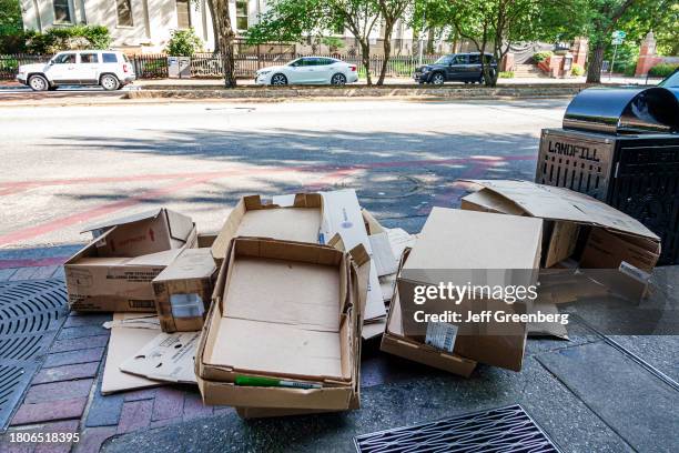 Athens, Georgia, cardboard boxes waiting on curb, recycling trash .