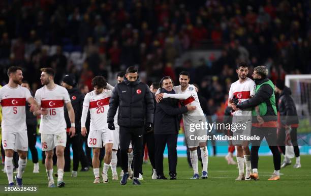 Players and Vincenzo Montella, Head Coach of Turkey celebrate after the UEFA EURO 2024 European qualifier match between Wales and Turkey at Cardiff...