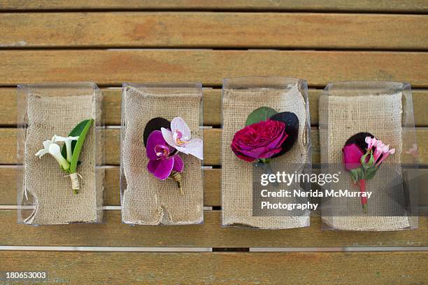 men's buttonholes for wedding outfit - buttonhole flower stock pictures, royalty-free photos & images