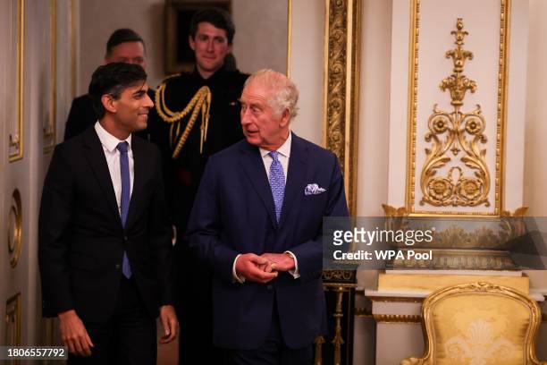 Britain's Prime Minister Rishi Sunak and King Charles III host a Global Investment Summit Reception at Buckingham Palace on November 27, 2023 in...
