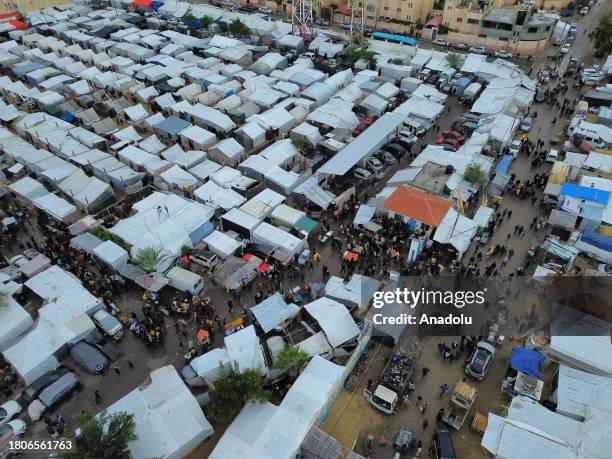 An aerial view of the United Nations Relief and Works Agency for Palestine Refugees tent camp, where hundreds of Gazan families fleeing Israeli...