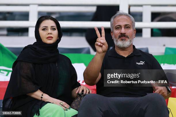 Iran player's parent support the team during the FIFA U-17 World Cup Round of 16 match between Morocco and IR Iran at Gelora Bung Tomo Stadium on...