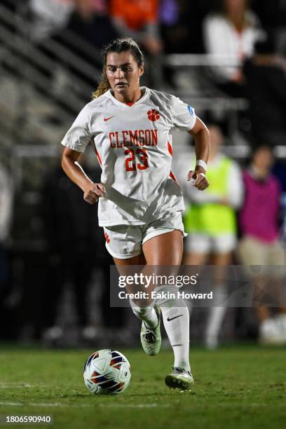Caroline Conti of the Clemson Tigers dribbles against the Columbia Lions in the first half during the second round of NCAA playoffs at Historic Riggs...
