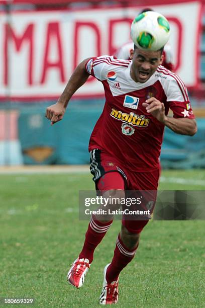 Danny Cure of Caracas FC runs for the ball during a match between Zulia FC and Caracas FC as part of the Torneo Apertura 2013 on September 15, 2013...